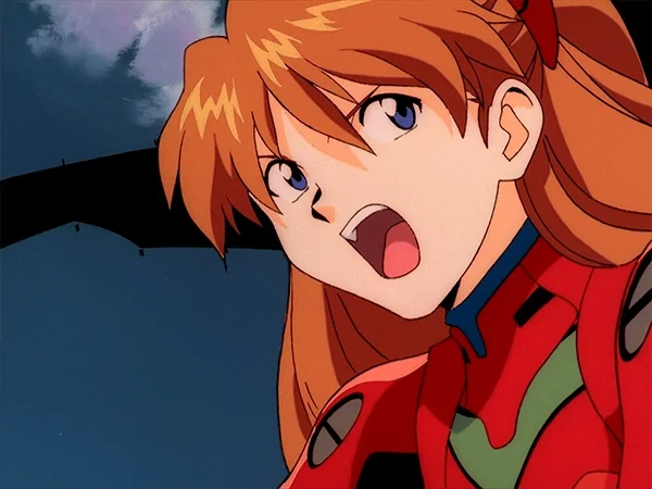 Asuka Langley Soryu shouting in her red plugsuit in the Neon Genesis Evangelion anime